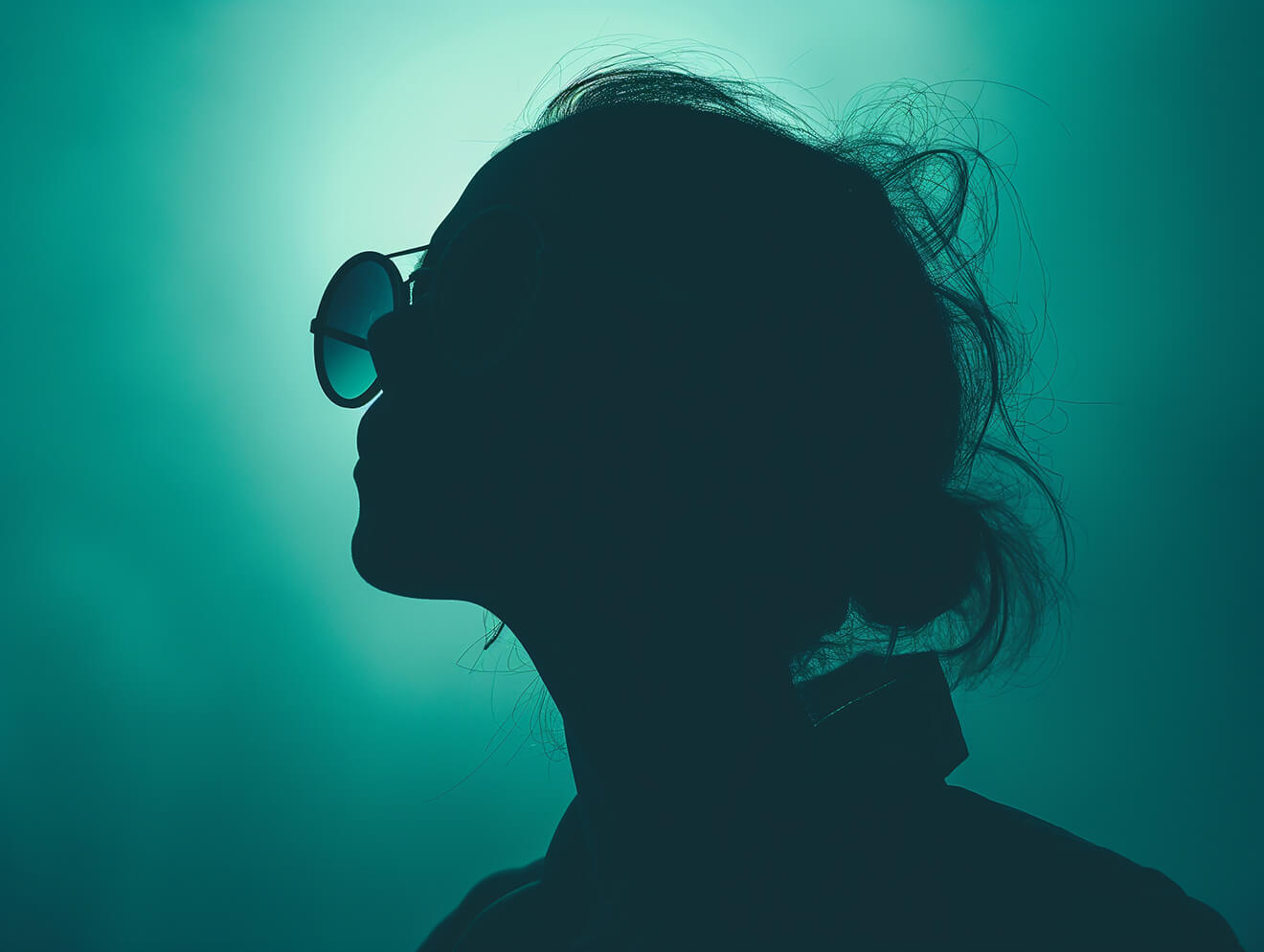 Contemplative-Silhouette-in-Teal